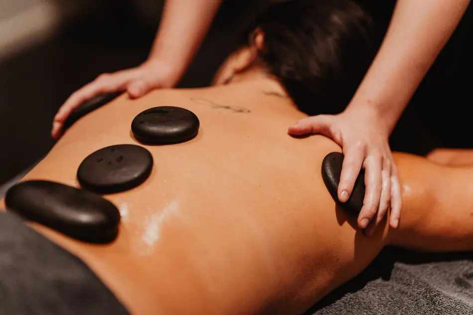 Hot stone massage during a package