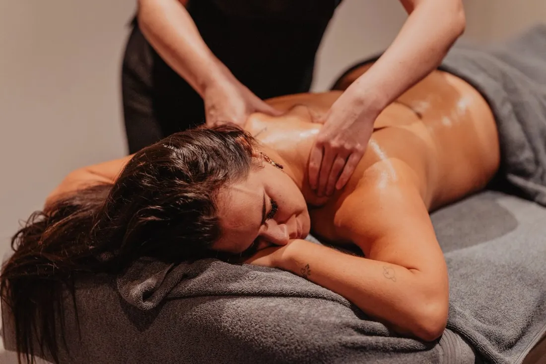 Relaxing massage in a warm treatment room